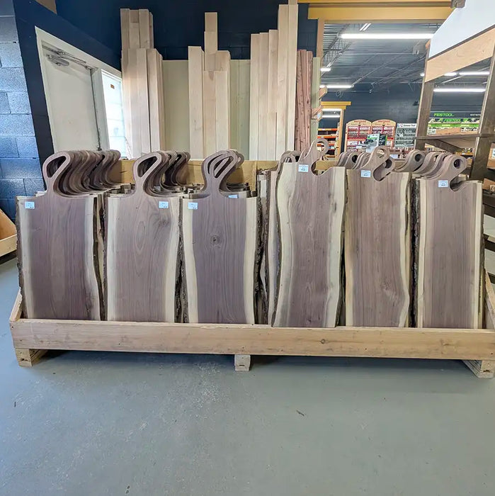 Walnut charcuterie boards live edge with small round handle and oblong handle
