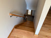 Wooden staircase with handrail in a home interior